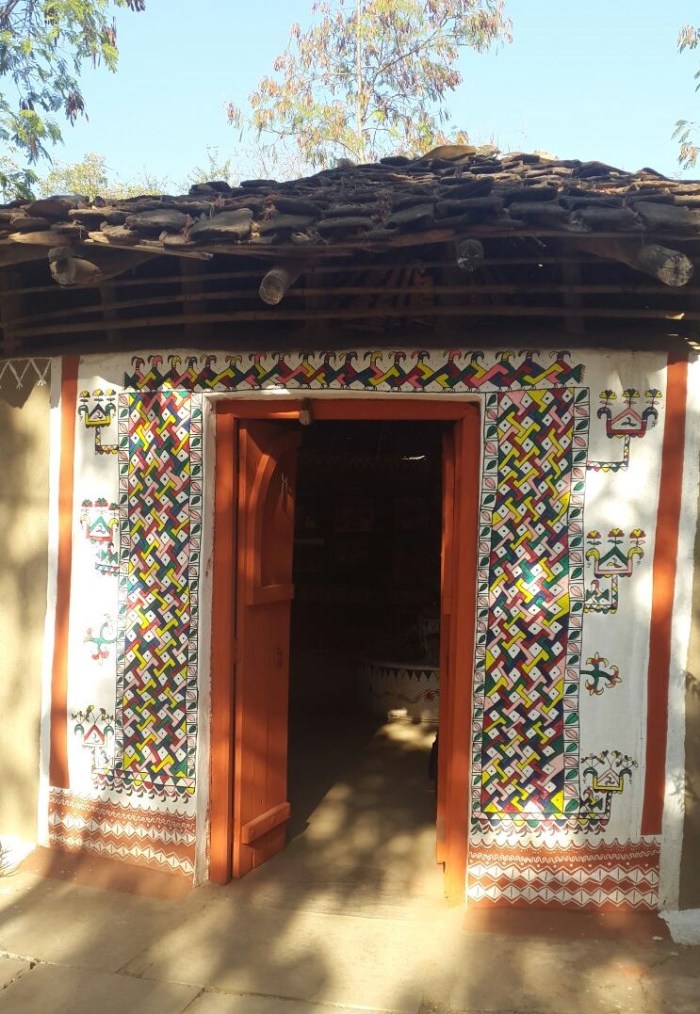 handpainted village hut door